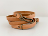 A genuine leather crossbody strap